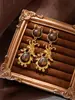 Pendientes Únicos y Exagerados de Nudo de Lazo Vintage con Borla de Piedra Ojo de Tigre para Mujer, Pendientes de Estilo Retro de Nicho de Lujo Ligero de Gama Alta