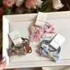 Set de 2 piezas oso de dibujos animados cachorro conejo flor pasador dulce BB clip lindo para niños pasador roto clip para flequillo