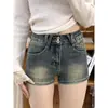 Shorts de mezclilla retro de cintura alta para mujer, nuevo estilo verano 2026, look vintage americano adelgazante, hot pants sexys de línea A que se ajustan a la cadera