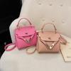 Bolsos cruzados bolso infantil moda europea y americana patrón de lichi mini bolso mensajero exquisito estilo occidental bolso de hombro bolso de mano