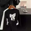 Ropa para Niñas Estilo Coreano Camiseta con Lazo Primavera y Otoño Nueva Versátil de Manga Larga para Niños Bebés Tops para Base de Otoño