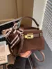 Bolso Pequeño Vintage Otoño 2025 Nuevo Moda para Mujer Bolso Cruzado Versátil Bolso de Mano Vintage Tipo Kelly
