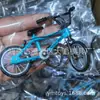 Chaveiro dedo bicicleta dedo skate bicicleta oito chaveiro fecho lagosta joias brinquedos transfronteiriços