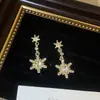 Brincos europeus e americanos exagerados, novos, com borla de flor de pérola e diamante, leves, luxuosos e sofisticados, para mulheres