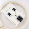 Nuevo especial transfronterizo explosión de tendencia europea y americana titanio acero alta calidad color collar pendientes traje femenino joyería de concha real