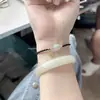Pulsera con Colgante de Flor de Durazno de la Suerte Popular de Xiaohongshu para Mujer, Cuerda de Mano de Nicho con Dulce Temperamento, Joyería de Regalo