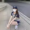 Versión coreana de traje deportivo casual de dos piezas para mujer, de manga corta, holgado, para correr en verano, venta al por mayor, comercio exterior