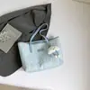 Bolsa de Ombro Casual de Grande Capacidade para Mulheres 2025 Novo Verão Versátil Simples para o Dia a Dia Moderna Tote de Axila Bolsa Grande
