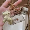 Colgante de Oro para Riqueza Instantánea, Llavero, Colgante para Bolso, Fortuna Rápida, Artículo Popular para Transmisiones en Vivo, Venta al por Mayor, Regalo del Año del Caballo