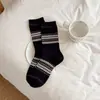 Nuevos calcetines apilados de longitud media de tendencia étnica de doble estilo vintage para otoño e invierno al por mayor, calcetines originales únicos para mujer