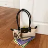 Bolso tipo baguette de lujo estilo francés, bolso tipo dumpling moderno y a la moda, versátil para el uso diario, bolso de hombro y para debajo del brazo de moda