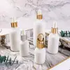Botella cuentagotas de porcelana blanca Jade Blanco a prueba de luz de 10 ml para aceite esencial, botella rociadora de 50 ml, botella secundaria de 20 ml