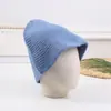 2022 Nuevo gorro de pescador de lana primavera y otoño japonés lindo color sólido gorro de punto para mujer gorro de lana versátil suministro de fábrica