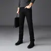 Jeans negros de alta gama que no se decoloran de Hong Kong para hombre, corte slim, nuevos pantalones largos casuales elásticos de otoño 2026