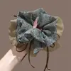 Novo scrunchie de alta qualidade para rabo de cavalo baixo 2026 para mulheres, apresentando um estilo inspirado em Melard, um acessório de cabelo retrô para outono e inverno