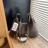 Bolso Retro de Gran Capacidad Transfronterizo para Mujer 2026 Nuevo Bolso de Hombro Casual Bolso Cruzado Versátil de Alta Gama