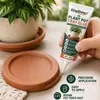 A Cola de Reparo para Prato de Vaso KineShineX é adequada para colar rachaduras em pratos de vaso de cerâmica e plástico.