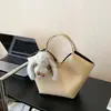 Bolso de Cubo de Mano Casual de Nicho para Mujer 2025 Invierno Nuevo Bolso de Hombro Cruzado de Alta Calidad para Viajes