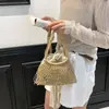 Bolso Tejido Hueco de Diseño de Nicho para Mujer 2026 Nuevo Estilo de Vacaciones Bolso de Mano Bolso de Hombro Bolso de Red para Vacaciones en la Playa