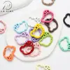 Chaveiro de fivela de mola com cabeça de urso KT colorido, acessórios para joias DIY, fivela de decoração de embalagem, pingente de corrente para celular, atacado