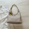 Bolsa de mano de gran capacidad de color liso, nueva bolsa de hombro retro de moda para el verano 2026, bolsa de axila de moda para el trabajo y los desplazamientos