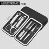 Set de belleza de cortaúñas al por mayor, tijeras para uñas a cuadros, cuchillo para pedicura, cortaúñas de acero inoxidable, set de manicura y cuidado personal de 12 piezas