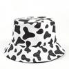 Venta caliente transfronteriza sombrero de pescador de panda de dibujos animados femenino coreano ocio vaca doble cara de ala plana sombrero para el sol al por mayor