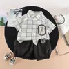 Conjunto Curto de Verão 2026 para Meninos, Camisa Estilosa com Estampa Xadrez Quadrado, Conjunto de Duas Peças com Shorts, Tendência