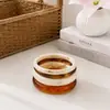 Suministro exclusivo transfronterizo de pulseras redondas de resina de moda, tendencia y nicho, venta al por mayor de joyería vintage redonda de resina degradada