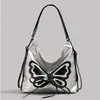 Bolso de Mariposa de Nicho para Mujer 2026 Nueva Moda Versátil Bolso de Hombro Cruzado Debajo del Brazo Bolso para Estudiante Viajero