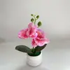 Planta artificial de Phalaenopsis en maceta con 2 flores, maceta tipo donut para decoración de interiores, planta artificial en maceta para arreglos de hoteles y restaurantes.