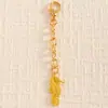 Accesorios de bikini de temática oceánica más vendidos transfronterizos: colgantes de estrella de mar y concha chapados en oro, accesorios de decoración para traje de baño DIY al por mayor
