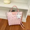 Otoño 2026 Nuevo Estilo Estilo ins Versátil Bolso de Mano de Estrella para Viajes Diarios Moda para Mujer Gran Capacidad Bolsa de Compras Bolsas de Mujer al por Mayor