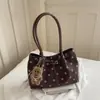 Bolsa feminina de camurça 2026 novo modelo de outono, bolsa de ombro vintage Maillard de alta qualidade, bolsa tote de grande capacidade
