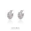 Aretes pequeños con forma de serpiente con circonitas microincrustadas, aretes de aguja de plata S925, aretes de diseño de nicho de circonitas de lujo ligero, estilo extranjero femenino