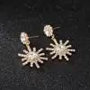 Versión coreana de pendientes de copo de nieve brillantes pendientes de temperamento y personalidad para mujer pendientes largos con borla colgante pendientes de strass E582
