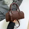 Bolso de mano único para bolos para mujer, nuevo modelo primavera 2026, bolso de hombro cruzado simple, bolso tipo almohada de moda