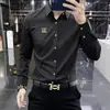 Camisa de manga larga para hombre de marca francesa de alta gama, corte slim, elástica, nuevo modelo de otoño, resistente a las arrugas, color liso, camisa casual
