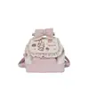 Mochila Infantil de Dibujos Animados Linda MyMelody Patrón de Fresas Encaje Rosa Lazo Bolsa Escolar con Colgante de Muñeca