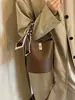 Bolso de mujer transfronterizo, bolso tipo cubo de gran capacidad, nuevo bolso versátil para el día a día de Henggeng para llevar al hombro y cruzado, conjunto de bolsos de mano a la moda