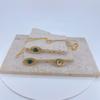 Collar Elegante con Colgante Único de Diseño Calado de Ojo de Diablo Transfronterizo Ins Europeo y Americano con Circonita Microincrustada Diamante Completo