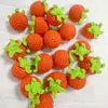 Colgantes hechos a mano terminados: caqui, cacahuete, manzana, fresa, melocotón, pera, llaveros, girasoles de hilo, productos tejidos al por mayor