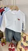 Nueva Camisa Polo Bordada de Algodón Puro para Niños Otoño 2026 Nueva Camiseta de Manga Larga Simple Casual Versátil