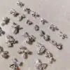 Arte de Uñas Transfronterizo Ultra Brillante Circonita Lazo Plateado Decoración de Uñas Celebridad de Internet Popular Venta Caliente Mariposa Pequeña Accesorios para Uñas Al por Mayor