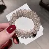 2025 Diadema Pulsera de Perlas y Cristales de Lujo Ligero Cuerda para el Cabello de Doble Propósito Cuerda para el Cabello Estilo Ins Mori Simple de Celebridad de Internet Banda de Goma