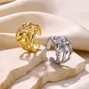 Anillo de serpiente nuevo transfronterizo forma de hoja de estrella de cuatro puntas anillo para hombres y mujeres Anillo abierto anillo de lava generación cabello