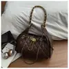 Bolsa Pequena Estilo Francês da Moda Feminina 2026 Nova Bolsa Saco de Balde High-End para o Dia a Dia Corrente Acolchoada Bolsa de Ombro Único para o Braço