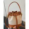 Bolso para Mujer 2026 Nuevo de Moda Estilo Coreano Versátil Bolso de Hombro Cruzado Tejido con una Textura Elegante y Bolso Cubo de Bloques de Color