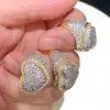 Suministro transfronterizo de nuevo anillo de circón en forma de corazón Europa y Estados Unidos hip-hop con incrustaciones de circón anillo de dos colores anillo al por mayor al contado