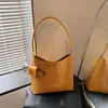 Bolso tejidode moda de gran capacidad para mujer, nuevo modelo primavera 2026, bolso de hombro cruzado simple para el día a día, bolso de axila